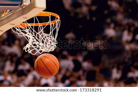 Scoring the winning points at a basketball game Royalty-Free Stock Photo #173318291