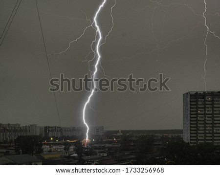 Lightning bolt in a tree in the city