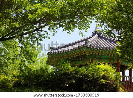 a wonderful Pavilion of Korean Traditional seen behind the trees
The letters written on the wooden board mean "Maebongsan Mountain pavilion".