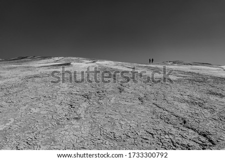 Black and white composition with moon lookalike landscape. The image was caught at Mud Volcanoes, in Berca/Romania bat can be scape of any other very dry area 