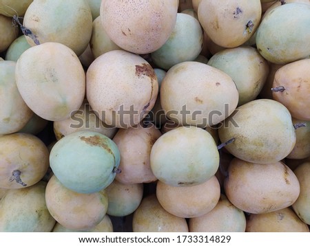 A mango is a juicy stone fruit produced from numerous species of tropical trees belonging to the flowering plant genus Mangifera, cultivated mostly for their edible fruit