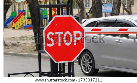 Road sign on a car background