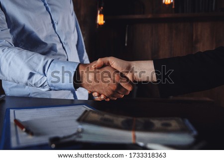 Contract sign concept. Man and woman making agreement and taking money.