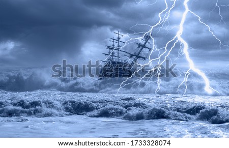 Sailing old ship in storm sea on the background heavy clouds with lightning Royalty-Free Stock Photo #1733328074