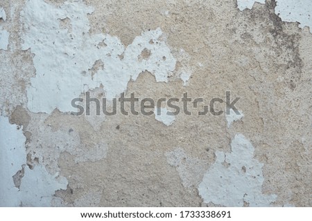 The old wall that has been peeled off to create various patterns