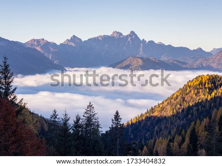 
The Agordina valley under the clouds