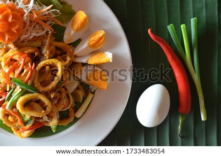 Thai food, stir-fried squid with salted eggs High angle pictures