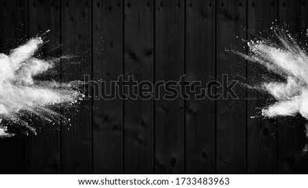 Black wood splash flour. Baking class or recipe concept on dark background, sprinkled wheat flour with free text copy space. Cooking dough or pastry black background. Wooden background text ready. Royalty-Free Stock Photo #1733483963