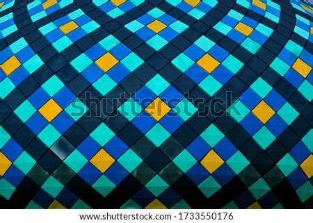 colorful abstract tile. Blue, green, yellow.