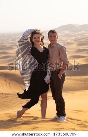 Romantic journey through the wild desert of the bride and groom.
