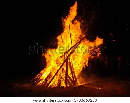Fire in the forest during shortest night festival