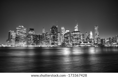 Black and white night view of Manhattan skyline and East river