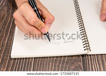 the appearance of pen-writing on a note