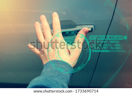 Human Chipping Concept, RFID Tags. A male hand with an implantable chip opens the door of a car, toning.