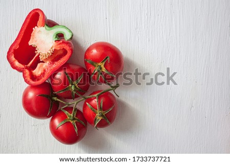 Photo of red pepper and tomatoes. Juicy red vegetables. Beautiful photo of vegetables. Recipe Design