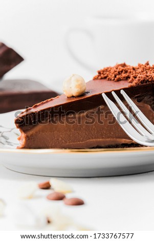 Tasty milk chocolate cake with nuts 