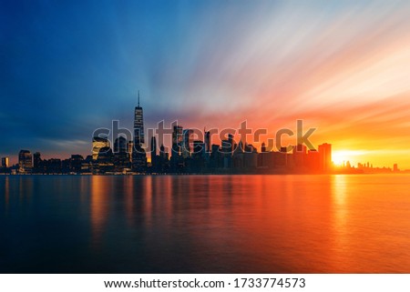 New York City skyline urban view from day to night with historical architecture 