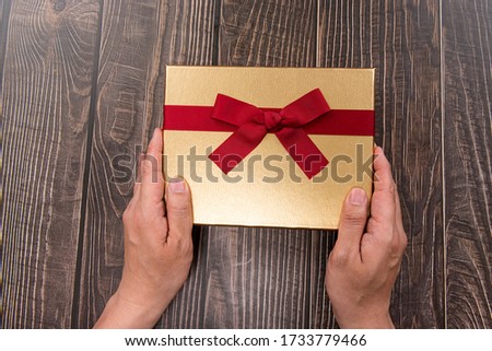 a picture of opening a gift box