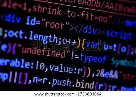 Macro of minified javascript file. Computer programming source code for HTML website development.