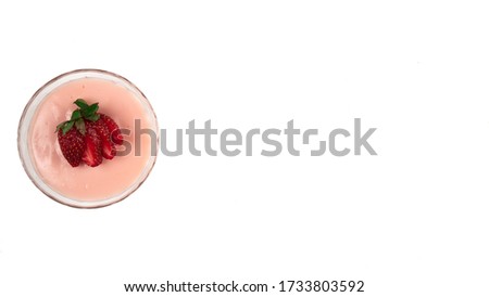 Close-up macro photo of strawberry pudding strawberry isolated on white background. Top view. Copy space for text message.