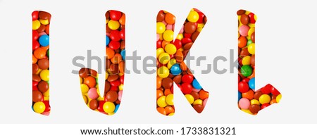 candy alphabet font i,j,k,l, made of real colored candy cut letter shape. Collection of brilliant candy font for your unique decoration with concept ideas