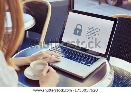 data protection and internet security concept, woman user typing password on computer for secured access