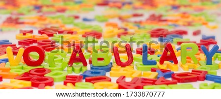 colored plastic letters forming word