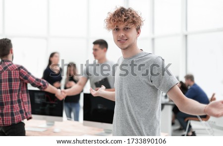 portrait of a young office employee in the workplace.