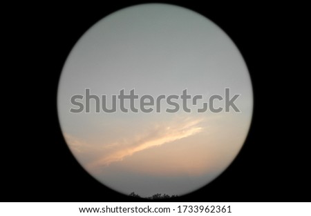 Beautiful sunset scenery view of colorful sky and sunlight coming through dark clouds, landscape background, nature photography