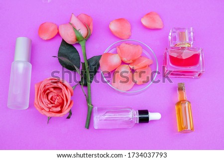 Essential oil in bottles extracted from rose.