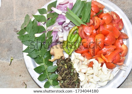 ingredients for preparing making Glycine max or Soya bean or soybean chunks masala fry gravy recipe tomato onion ginger garlic curry leaves