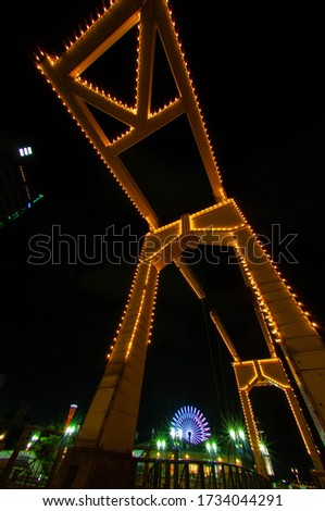 A huge bridge decorated with illuminations