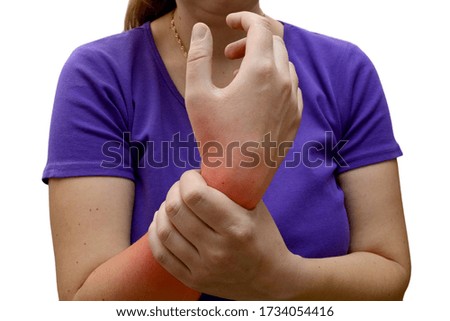 Woman suffering from pain in hand, red spot of pain, isolated on white background, horizontal photo. Healthcare and medical concept.