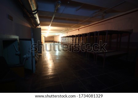 lighted corridor of an abandoned bunker