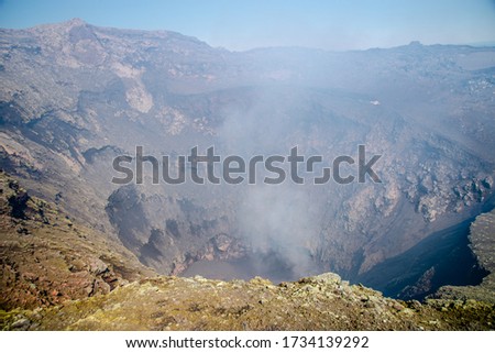 Villarrica Volcano, Chile. Volcano crater with smoke coming out of it.