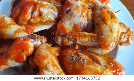 Baked chicken image with tomato sauce
