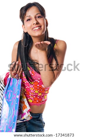 Young brunette girl with shopping bags, isolated on white background