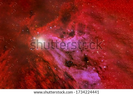 Beautiful red cosmic nebula in deep space. Elements of this image were furnished by NASA.