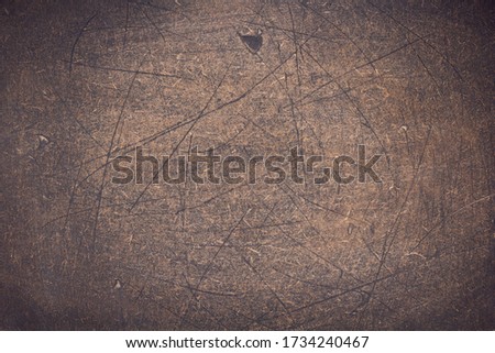 scratched wooden board background as texture surface
