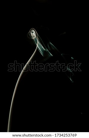 Green design on black background - Abstract lines of smoke - Movement