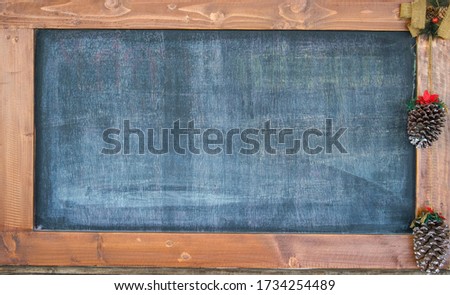 Small blackboard sign for daily food menu. Small chalk backboard with space for text.