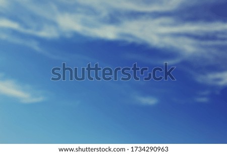 Blurred blue sky background banner. Natural bright blue cloudy sky defocused texture, simple nature skyscrape view on bright sunny day. Sunny weather outdoor, blue color sky horizon