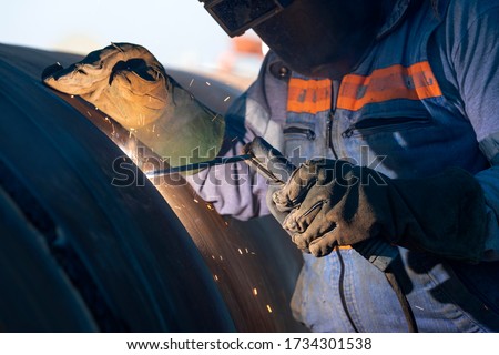 Shielded metal arc welding, manual metal arc weld, flux shielded arc weld or stick welding, is a manual arc welding process that uses a consumable electrode covered with a flux to lay the weld.
