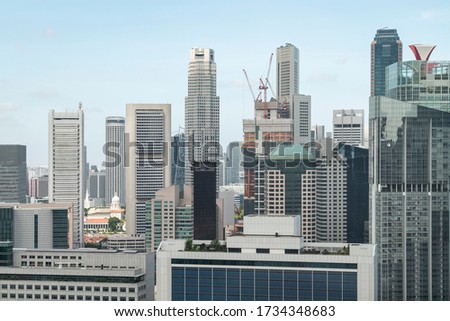 Picturesque panoramic view of Singapore city at day time. Financial and trading center hub in Asia region. Concept of success. Modern buildings in high-tech world.