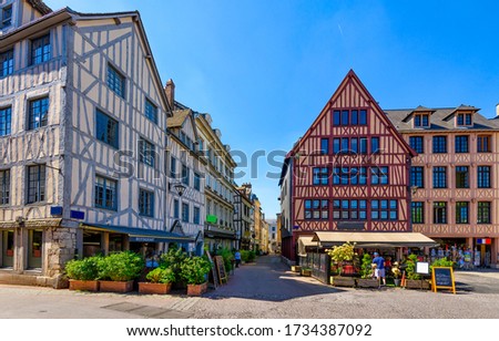 Street with timber framing houses in Rouen, Normandy, France. Architecture and landmarks of Rouen. Cozy cityscape of Rouen Royalty-Free Stock Photo #1734387092