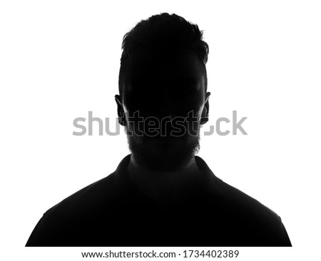 Silhouette of male person over white