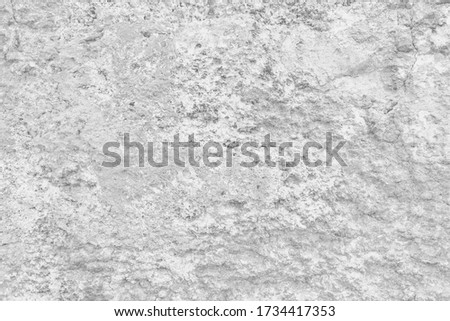 Age old canyon blocks. Cliff rough surface. Coarse bumpy raw limestone backdrop.  Grunge damaged erosion cracks . Natural heavy grotto wall.  Antique medieval hard marble front facade for design 3d