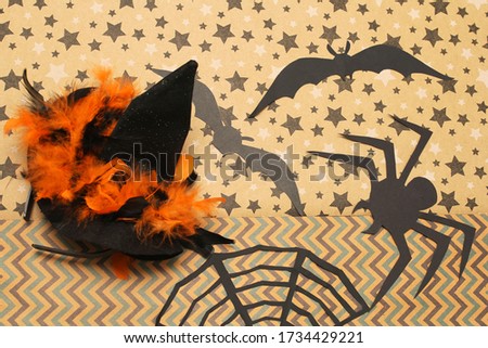 Halloween background with witch hat and spider, bat. Happy Halloween
