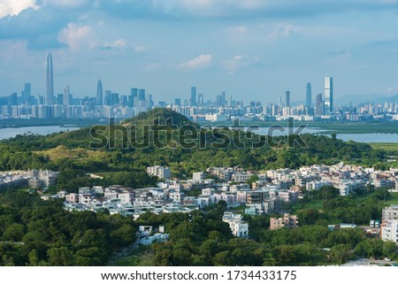Skyline of downtown of Shenzhen city and rural village of Hong Kong city