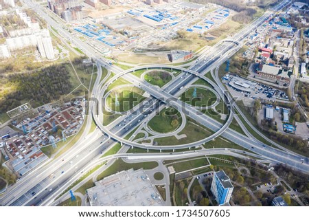 Top view of the multi-level road junction in Moscow from above, car traffic and many cars, the concept of transportation. road junction at the intersection of the Kashirskoe highway and ring road.